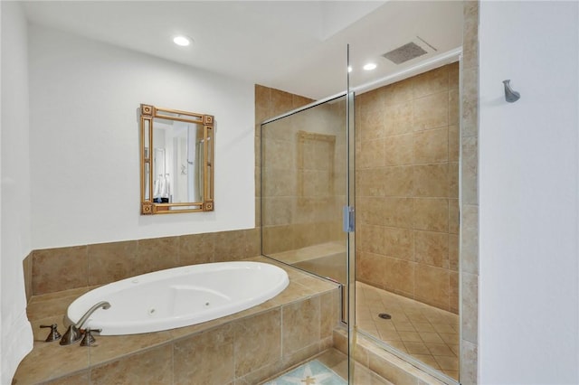 760 Ocean Blvd Unit 402, Saint Simons Island, GA 31522 - full bathroom featuring a jetted tub, a shower stall, and recessed lighting