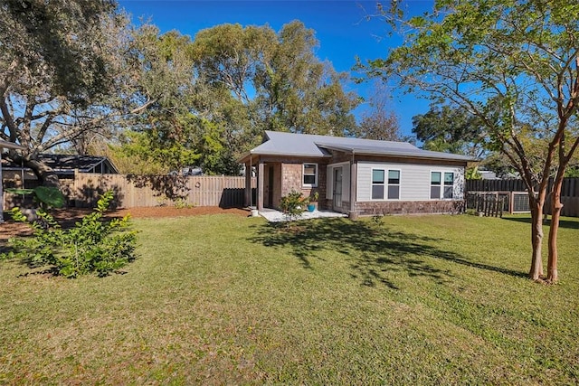 view of front of house with a front lawn