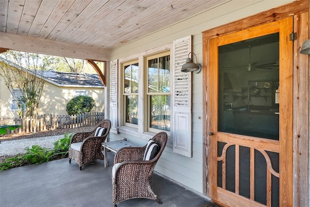 sunroom / solarium with wood ceiling