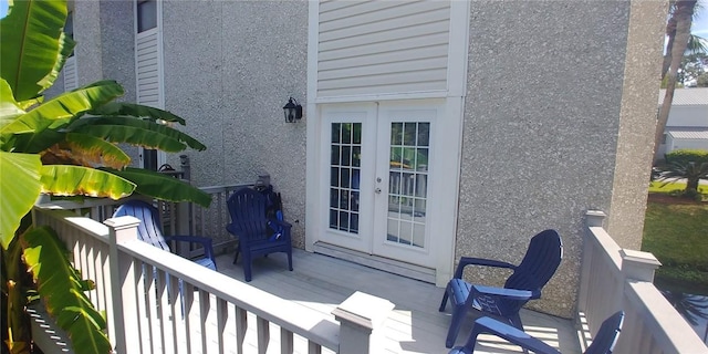 wooden terrace featuring french doors