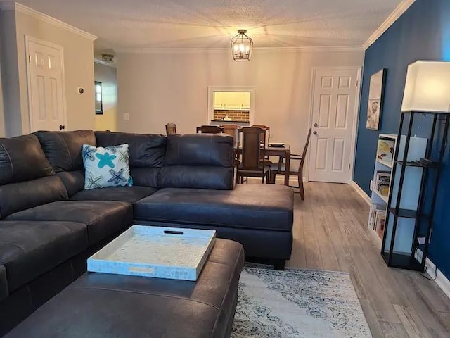 1000 Sea Island Rd Unit 72, Saint Simons Island, GA 31522 - living room featuring wood finished floors and crown molding