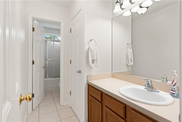 114 Shell Pointe Dr, Brunswick, GA 31525 - bathroom featuring tile patterned floors, vanity, and bath / shower combo with glass door