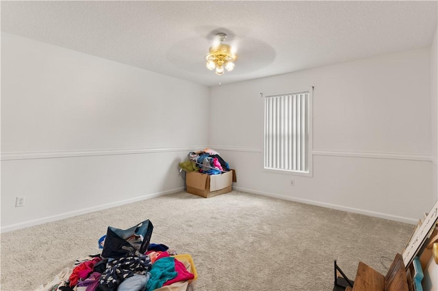 114 Shell Pointe Dr, Brunswick, GA 31525 - playroom with carpet flooring, a textured ceiling, and ceiling fan