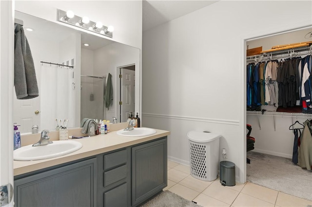 114 Shell Pointe Dr, Brunswick, GA 31525 - bathroom featuring tile patterned flooring, vanity, and walk in shower