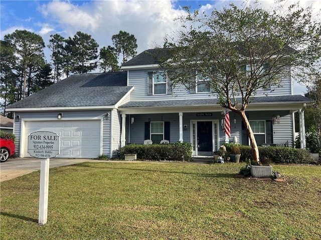 view of property with covered porch, a front yard, and a garage