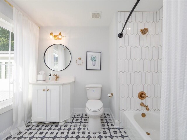 904 Champney, Saint Simons Island, GA 31522 - bathroom with vanity, shower / tub combo, and tile patterned flooring