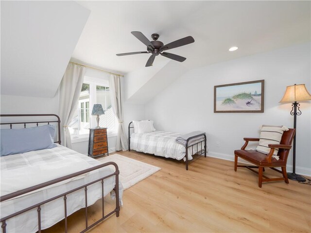 904 Champney, Saint Simons Island, GA 31522 - bedroom with lofted ceiling, light wood-type flooring, recessed lighting, and a ceiling fan