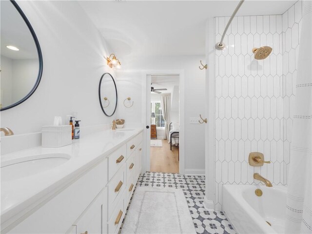 904 Champney, Saint Simons Island, GA 31522 - bathroom with double vanity, shower / tub combo with curtain, and ensuite bath
