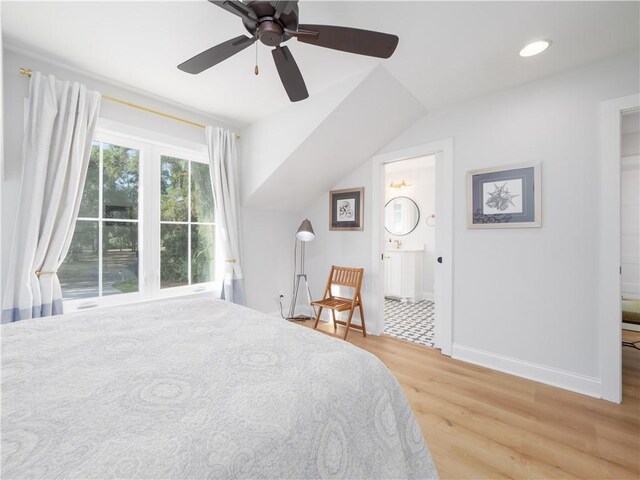 904 Champney, Saint Simons Island, GA 31522 - bedroom featuring light wood finished floors, ensuite bathroom, ceiling fan, and recessed lighting