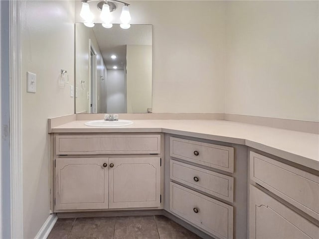 bathroom with tile patterned floors and vanity