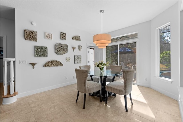 view of tiled dining space