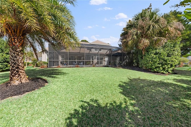 view of yard with a lanai