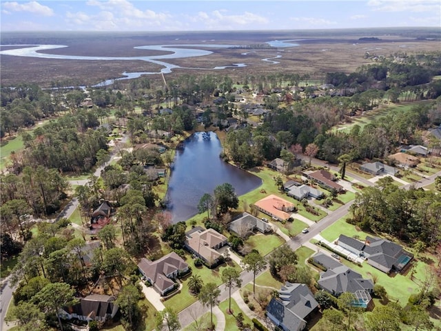 drone / aerial view with a water view