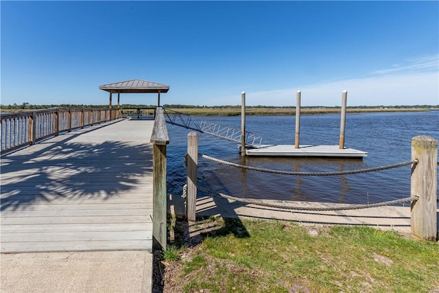 view of dock with a water view