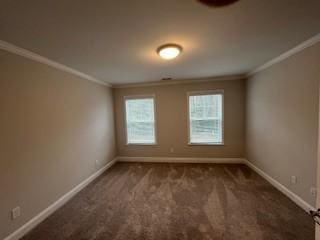 carpeted empty room with ornamental molding