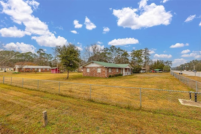 view of yard with a rural view