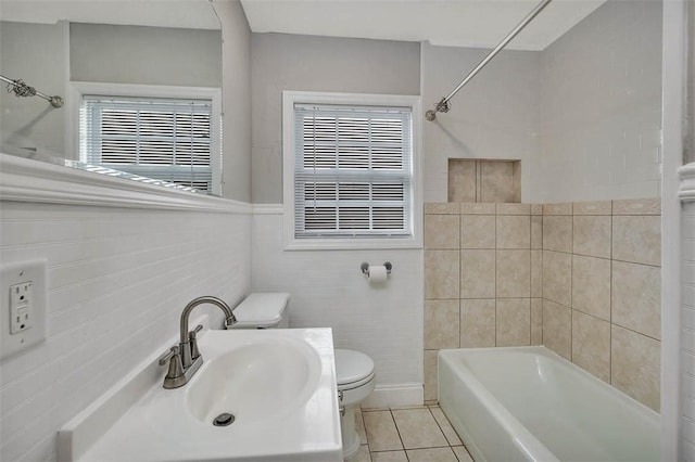 full bathroom featuring shower / tub combination, tile patterned flooring, a healthy amount of sunlight, and toilet