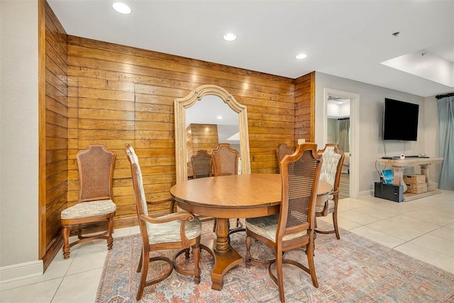 150 Salt Air Dr Unit 202, Saint Simons Island, GA 31522 - dining area featuring wooden walls, light tile patterned floors, and recessed lighting