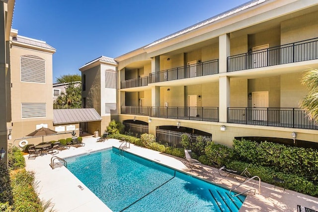 150 Salt Air Dr Unit 202, Saint Simons Island, GA 31522 - community pool with a patio area