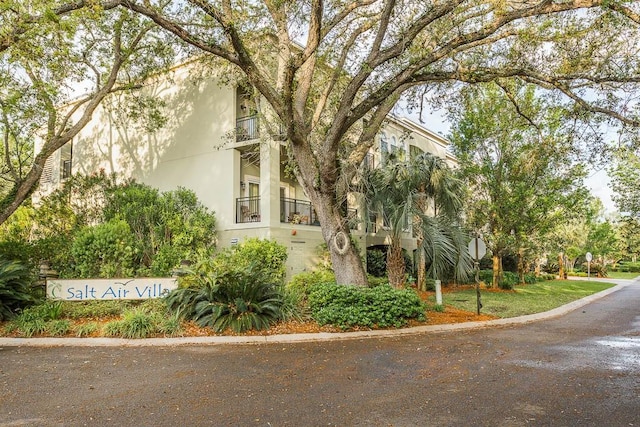 150 Salt Air Dr Unit 202, Saint Simons Island, GA 31522 - view of side of property featuring stucco siding