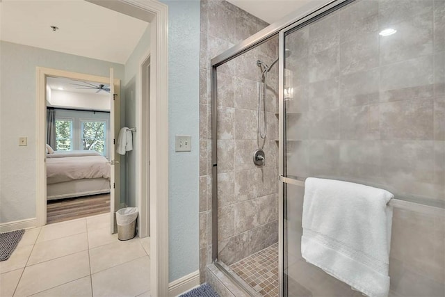 150 Salt Air Dr Unit 202, Saint Simons Island, GA 31522 - bathroom featuring connected bathroom, a stall shower, and tile patterned floors