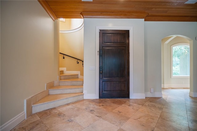 178 Hampton Point Dr, Saint Simons Island, GA 31522 - entrance foyer featuring arched walkways, stairs, and wooden ceiling