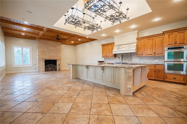178 Hampton Point Dr, Saint Simons Island, GA 31522 - kitchen with stainless steel double oven, a wood ceiling with exposed beams, tasteful backsplash, recessed lighting, and open floor plan