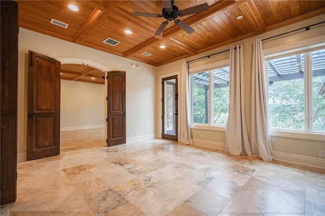 178 Hampton Point Dr, Saint Simons Island, GA 31522 - spare room featuring a wooden ceiling with exposed beams, healthy amount of natural light, a ceiling fan, arched walkways, and recessed lighting