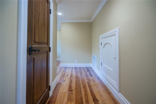 178 Hampton Point Dr, Saint Simons Island, GA 31522 - hallway featuring ornamental molding and wood finished floors