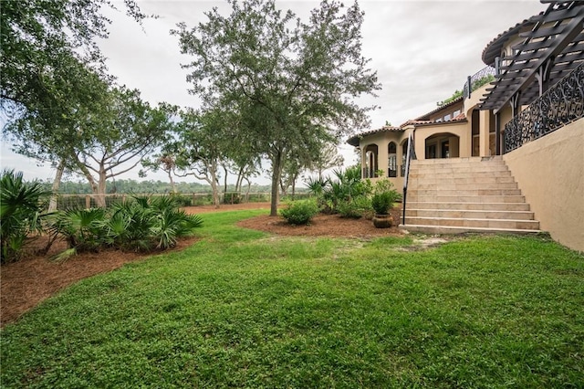 178 Hampton Point Dr, Saint Simons Island, GA 31522 - view of grassy yard with stairs