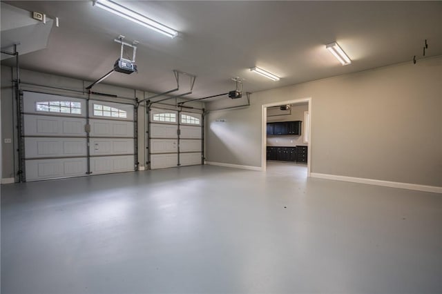 178 Hampton Point Dr, Saint Simons Island, GA 31522 - garage featuring a garage door opener