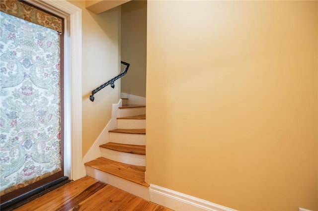 178 Hampton Point Dr, Saint Simons Island, GA 31522 - stairway featuring wood finished floors
