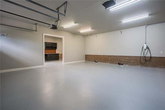 178 Hampton Point Dr, Saint Simons Island, GA 31522 - garage featuring a garage door opener