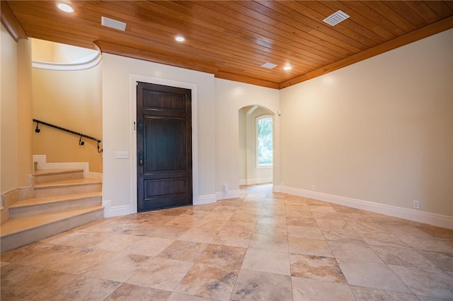 178 Hampton Point Dr, Saint Simons Island, GA 31522 - entryway with wooden ceiling, arched walkways, stairway, and recessed lighting