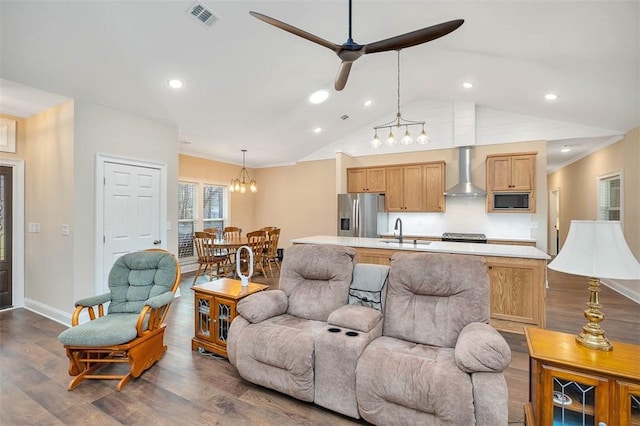 living room with dark hardwood / wood-style flooring, sink, lofted ceiling, and ceiling fan