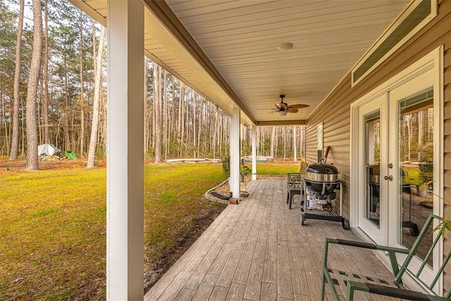 view of patio / terrace featuring french doors and ceiling fan