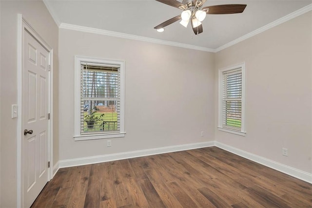 spare room with ceiling fan, ornamental molding, and dark hardwood / wood-style flooring