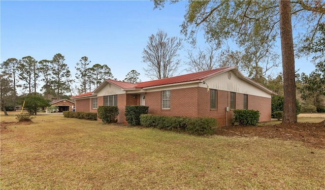 view of property exterior featuring a lawn