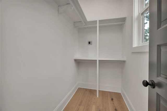 128 W Point Pkwy, Saint Simons Island, GA 31522 - spacious closet with wood finished floors