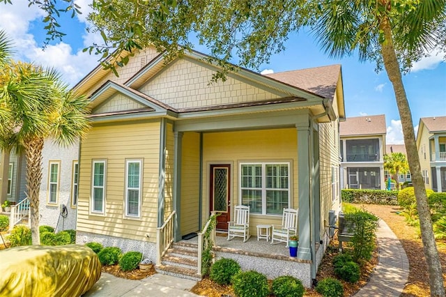 view of front of property featuring covered porch