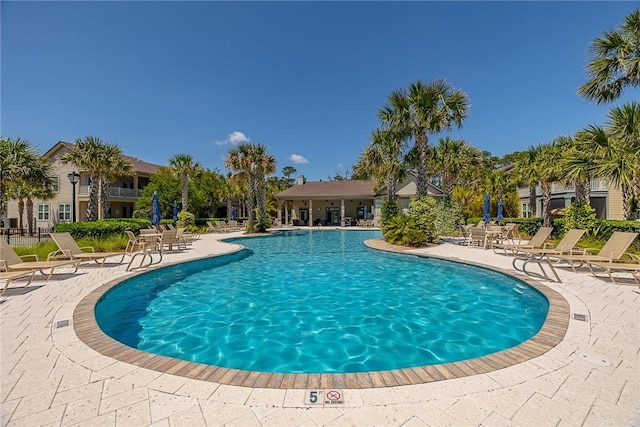 view of pool featuring a patio area