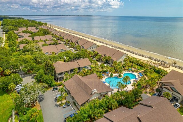 drone / aerial view featuring a view of the beach and a water view