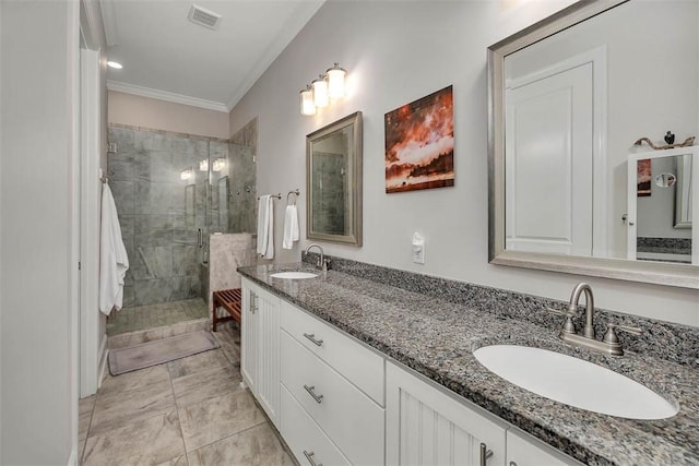 bathroom with vanity, ornamental molding, and walk in shower