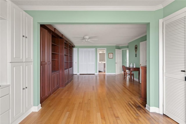 345 Moss Oak Cir, Saint Simons Island, GA 31522 - corridor with light wood-type flooring and crown molding