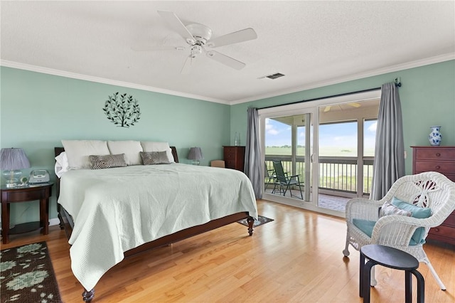 345 Moss Oak Cir, Saint Simons Island, GA 31522 - bedroom featuring ornamental molding, access to outside, wood finished floors, and a ceiling fan
