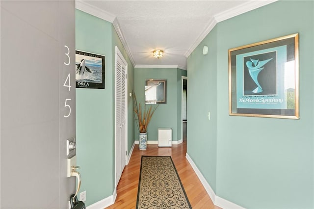 345 Moss Oak Cir, Saint Simons Island, GA 31522 - hall featuring ornamental molding and wood finished floors