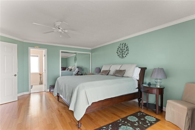 345 Moss Oak Cir, Saint Simons Island, GA 31522 - bedroom featuring ornamental molding, light wood-style floors, a closet, and a ceiling fan
