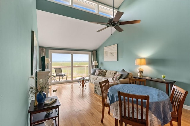 345 Moss Oak Cir, Saint Simons Island, GA 31522 - living area with vaulted ceiling, light wood-type flooring, and a ceiling fan
