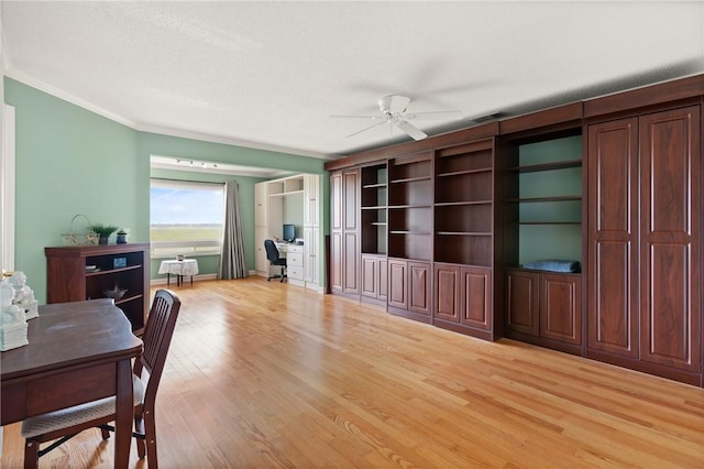 345 Moss Oak Cir, Saint Simons Island, GA 31522 - office space featuring crown molding, a ceiling fan, and light wood-style floors