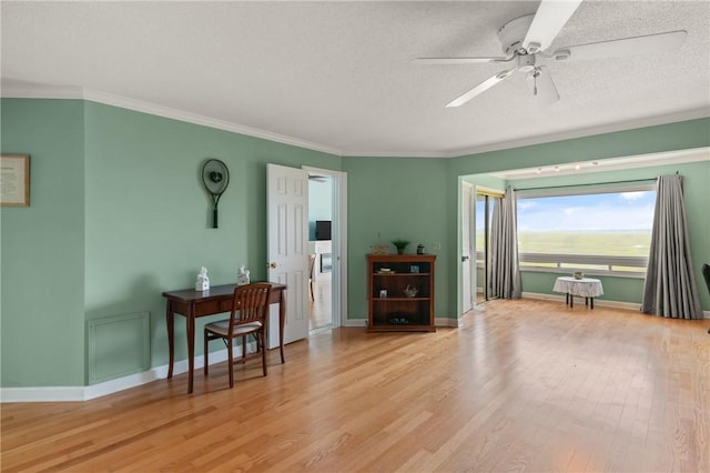 345 Moss Oak Cir, Saint Simons Island, GA 31522 - living room featuring ceiling fan, wood finished floors, crown molding, and a textured ceiling